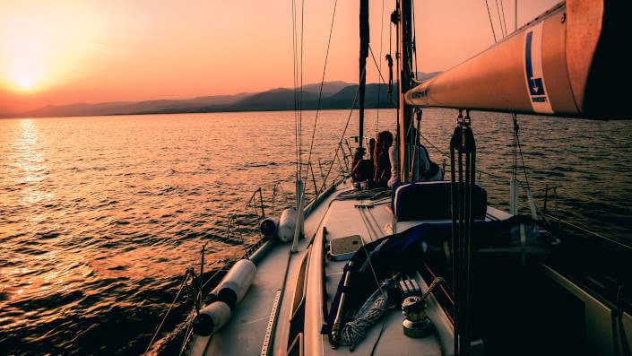 Sailing wilight sun sea
