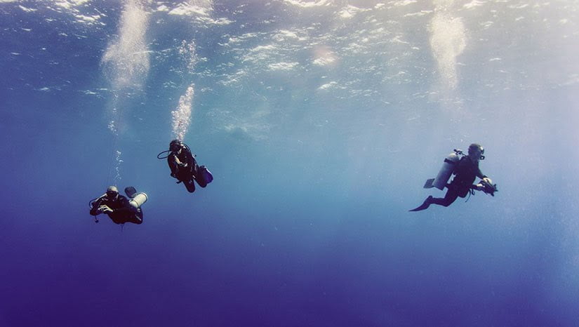scuba divers underwater